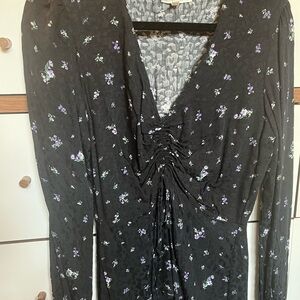 Fitted Black Top with Purple and White Accents